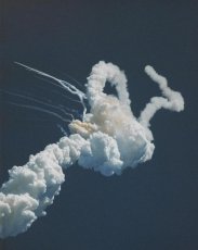 Huge smoke trails caused by the deadly surge of the Challenger shuttle 73 seconds after lose.